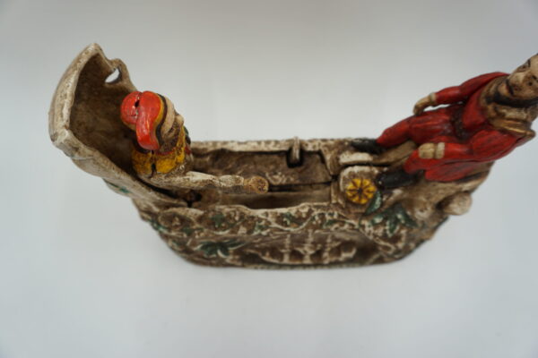 ŻELIWNA RUCHOMA SKARBONKA INDIANIN - ZABAWKA