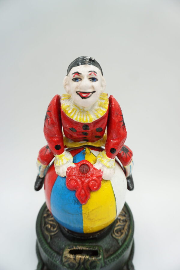 ŻELIWNA RUCHOMA SKARBONKA KLAUN - ZABAWKA