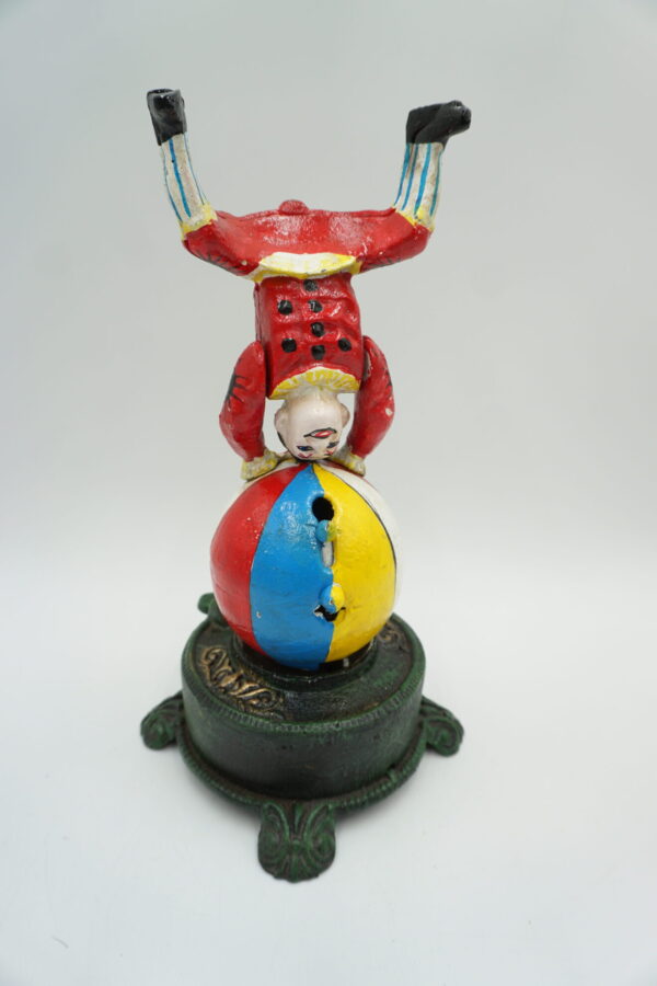 ŻELIWNA RUCHOMA SKARBONKA KLAUN - ZABAWKA