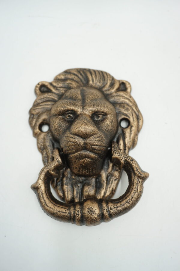 KOŁATKA ŻELIWNA LEW